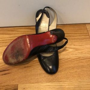 Louboutin black kid leather sling back heels.37